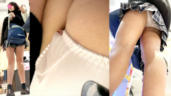 【upskirt2902逆さ撮りJK】サテンの薄ピンクPを太もも舐めのアングルでねっとりと撮られちゃう股間の膨らみがエロいカワイイJKの画像