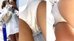 【upskirt3223逆さ撮り】シミのある黄色い星柄白綿Pを撮られちゃう青白ストライプワンピの若い娘の画像