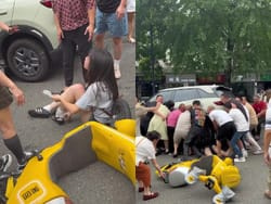 中国女子、SUV車に轢かれて股間丸出しで救出されるの画像